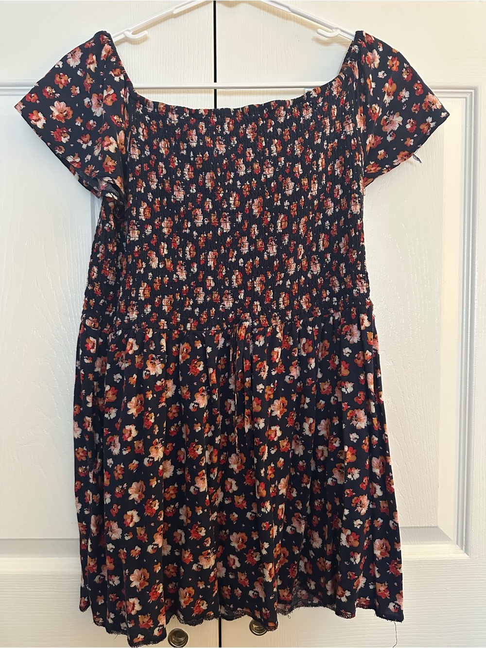 Xhilaration Navy Smocked Top with Red Floral Accent